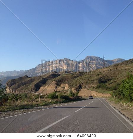 The mountains. snow-capped mountains . Caucasus Mountains . Mountains in the clouds. Beautiful snow-capped mountains in the summer . Elbrus in the clouds
