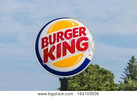 Mount Pocono, Pennsylvania, July 15, 2016: A large Burger King sing is attached to a pole that rises above ground.