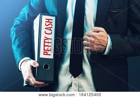 Tracking petty cash with businessman and ring binder for accounts and receipts