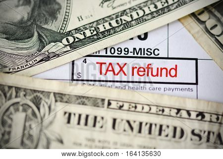 Claim a tax refund concept with form template close up