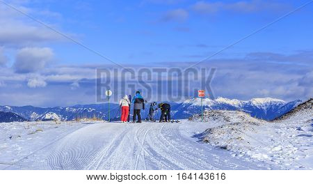 Skiers prepare for the descent from the mountain.Bakuriani.Georgia