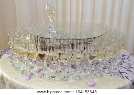 Restaurant champagne glasses arrangements for wedding reception