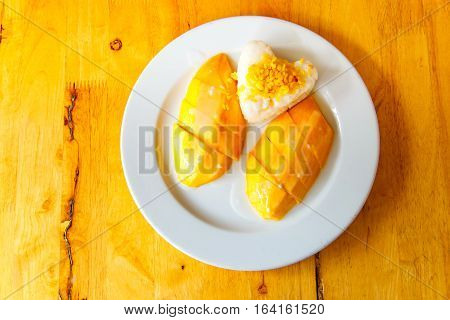 Thai sweet sticky rice with mango. Thai style tropical dessert glutinous rice eat with mangonature