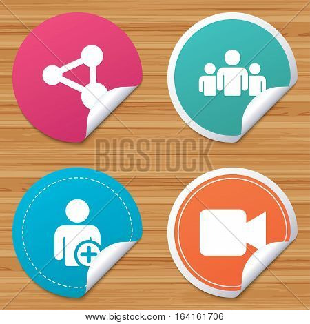 Round stickers or website banners. Group of people and share icons. Add user and video camera symbols. Communication signs. Circle badges with bended corner. Vector
