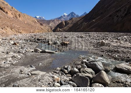 road over a stream in a mountain gorge, Himalaya, Nepal