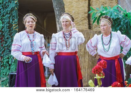 SLAVYANSK-ON-KUBAN RUSSIA - JULY 31.2015: Cossacks sing at a village fete