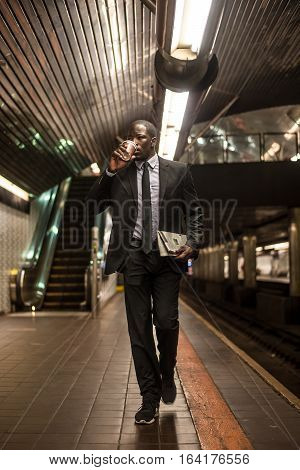 Businessman in full suit in New York subway metro