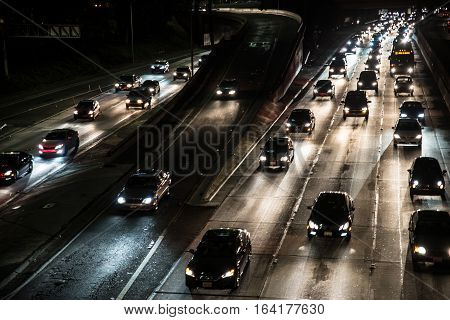 Traffic on a highway many cars driving