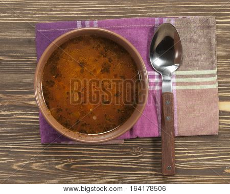 Russian cabbage soup (Shchi) in ceramic bowl