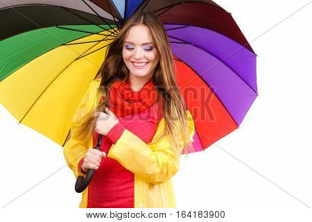 Woman In Rainproof Coat Under Umbrella