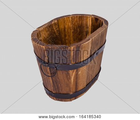 A small wooden bucket with iron fitting