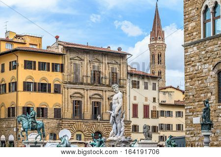 Piazza della Signoria. Neptune statue. Cosimo monument. Palazzo Vecchio. Florence, Italy.