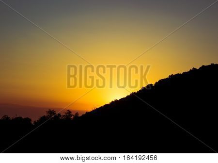 Beautiful sunrise view in the mountains silhouette