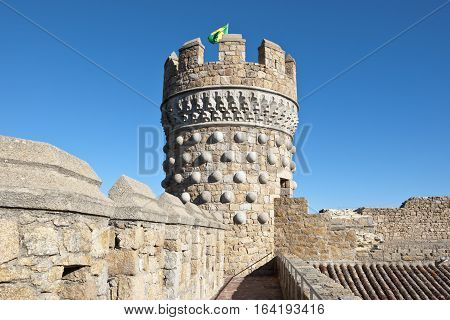 Tower of the New Castle of Manzanares el Real, Madrid, Spain. Also known as Castle of los Mendoza, it is a palace-fortress erected in the 15th century