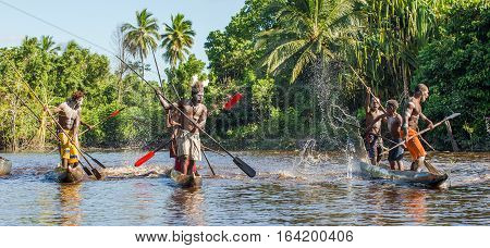 Indonesia, Irian Jaya, Asmat Province, Jow Village - June 23: Canoe War Ceremony Of Asmat People. He