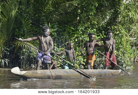 Indonesia, Irian Jaya, Asmat Province, Jow Village - June 23: Canoe War Ceremony Of Asmat People. He
