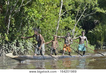Indonesia, Irian Jaya, Asmat Province, Jow Village - June 23: Canoe War Ceremony Of Asmat People. He
