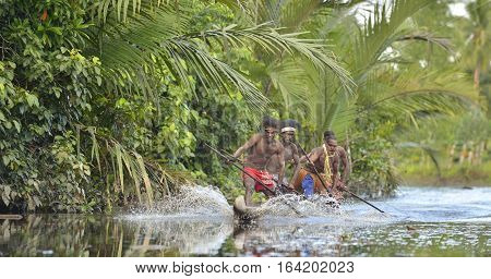 Indonesia, Irian Jaya, Asmat Province, Jow Village - June 23: Canoe War Ceremony Of Asmat People. He