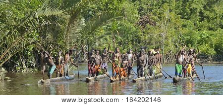 Indonesia, Irian Jaya, Asmat Province, Jow Village - June 23: Canoe War Ceremony Of Asmat People. He