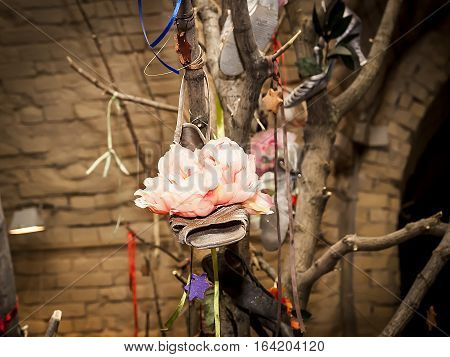 shoe and flower and ribbons on tree