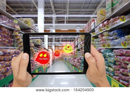 internet of things marketing concepts,smart augmented reality,customer hold the tablet to see the product that search by ai application with hot deal,daily deal