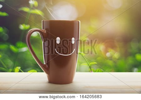 Brown coffee cup empty front porch the morning. Good morning or Have a happy day message concept