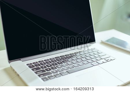 Notebook and smartphone . close up Seleted focus.