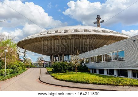Eindhoven Netherlands - April 12 2016: Evoluon building in Eindhoven. Its a conference centre and former science museum erected in 1966 it has become a landmark and a symbol for the city.