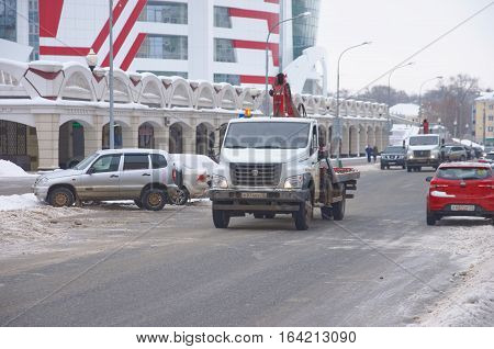 SARANSK, RUSSIA - JANUARY 6, 2017: GAZon Next tow truck at city street. Photo taken at cloudy day.