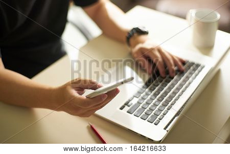 Young sman hand using smart phonemobile payments online shopping.Seleted focus.