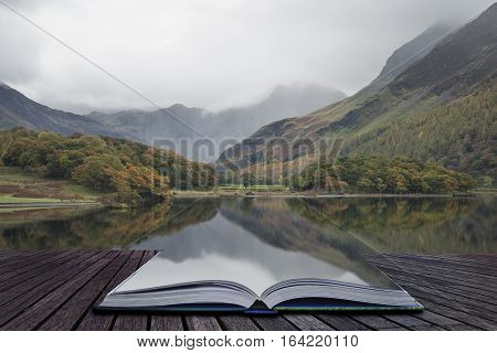 Beautiful Autumn Fall Landscape Image Of Crummock Water At Sunrise In Lake District England Coming O