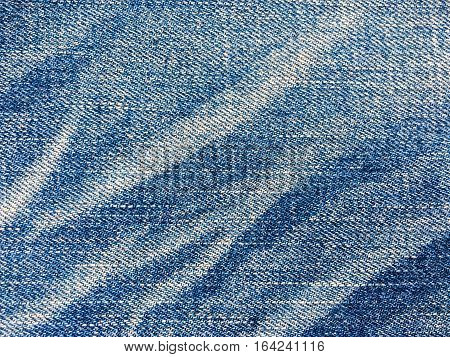 Texture of blue jeans demim fabric background