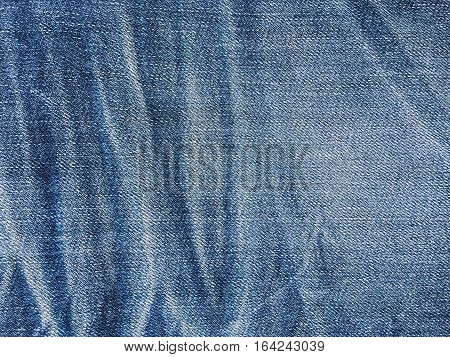 Texture of blue jeans demim fabric background