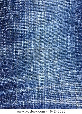 Texture of blue jeans demim fabric background