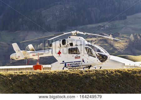 Matrei, Austria - March 28: Red Cross Medic Md Helicopter Md Explorer By Mcdonnell Douglas Helicopte
