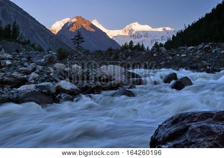 Mountain Altai. Akem fast mountain river on a background of mountain Belukha