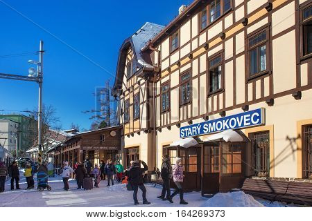 SLOVAKIA STARY SMOKOVEC - JANUARY 06 2015: Rush hour at railway station Stary Smokovec in High Tatras mountains. Is a popular resort for skiing and hiking. And junction of the Tatra Electric Railway