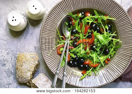 Salad With Arugula,black Olives And Grilled Bell Pepper.top View.