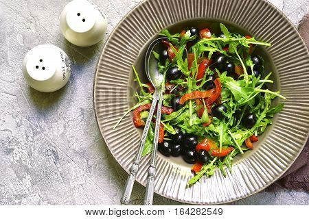 Salad With Arugula,black Olives And Grilled Bell Pepper.top View.