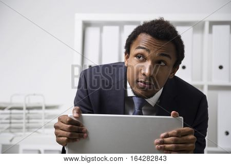 Shy African American Clerk