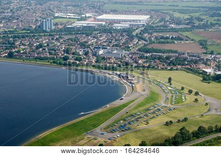 View from a plane of the Queen Mother Reservoir and Datchet Sailing Club in Berkshire on a sunny morning in June.