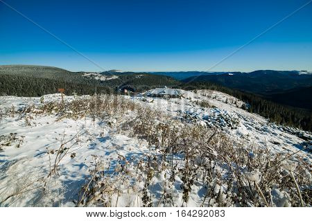 Climbing in the mountains in winter. National park