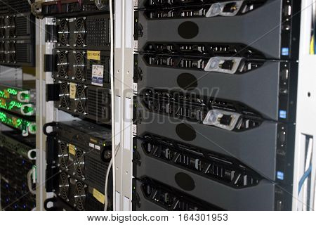 Several racks of servers in the data center server room