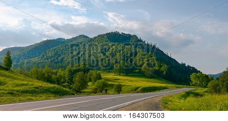 The road in the beautiful mountains in the summer.
