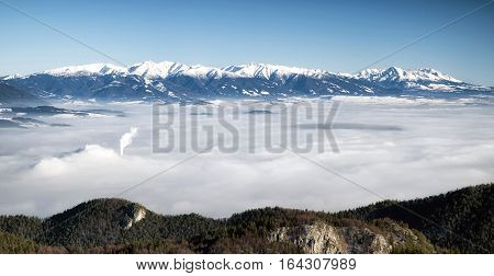 Beautiful winter landscape and inversion layer. West and High Tatras from Malino Brdo Slovakia