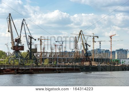 Nizhny Novgorod. Port cranes on the Strelka and the construction of stadium for the World Cup