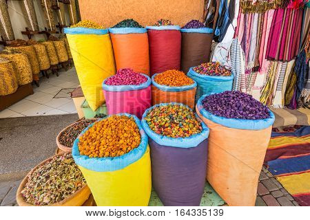 Lot of different herbs and spices on the market in Marrakech Morocco