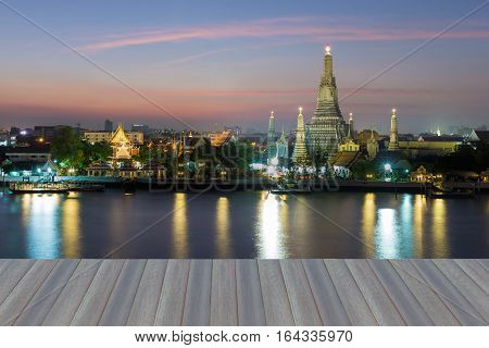 Opening wooden floor Arun termple river front with twilight sky background