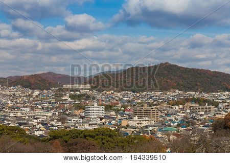 Himaji cityscape downtown with mountain background Japan