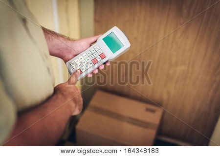 Messenger leaving parcel at your door in your absence